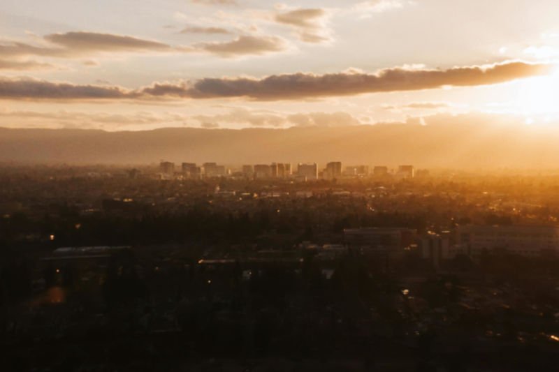 City skyline of San Jose, California at sunrise used for San Jose dumpster rental directory card
